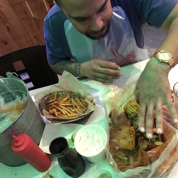 The Crab Shack - Digging in! Corn, potatoes, sausage.. medium option is way too hot. - Cajun/Creole Near Me - Gardena, California The Crab Shack - Digging in! Corn, potatoes, sausage.. medium option is way too hot. - Cajun/Creole Near Me - Gardena, California