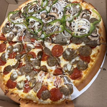 Nasry's Pizza & Grill - a pepperoni, sausage, and pepperoni pizza - Pizza Near Me - Orlando, Florida Nasry's Pizza & Grill - a pepperoni, sausage, and pepperoni pizza - Pizza Near Me - Orlando, Florida