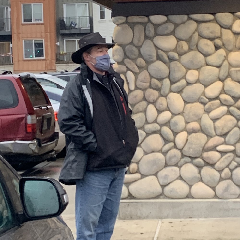 Platinum Parking guy just standing outside the store watching for people to leave the parking lot. Platinum Parking guy just standing outside the store watching for people to leave the parking lot.