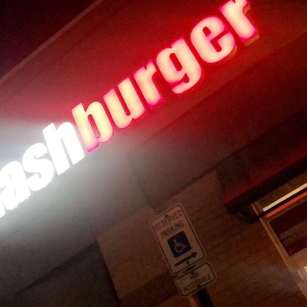 a neon sign for a fast food restaurant a neon sign for a fast food restaurant
