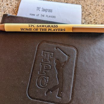 TPC Sawgrass - TPC branded restaurant checkbook and pen at Nineteen restaurant at TPC Sawgrass. I love it. - Golf Near Me - Ponte Vedra Beach, Florida