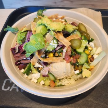 CAVA - Harissa honey chicken + hot harissa vinaigrette. Crazy Feta, hummus, corn, avocado, rice, SuperGreens, more. - Mediterranean Near Me - Chino Hills, California
