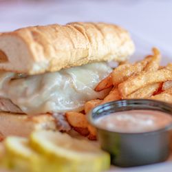 Chandler's Chophouse Grille & Banquets - Roast Beef Sandwich with a side of Fries