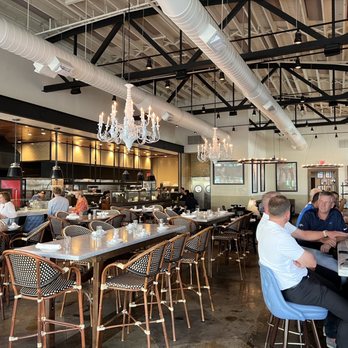Grato - people sitting at tables in a restaurant - Tuscan Near Me - West Palm Beach, Florida