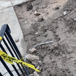TowsonTown Place Apartments - My front yard after they "fixed" an active spring, buried wires and an eyesore. Who leaves a job like this?!