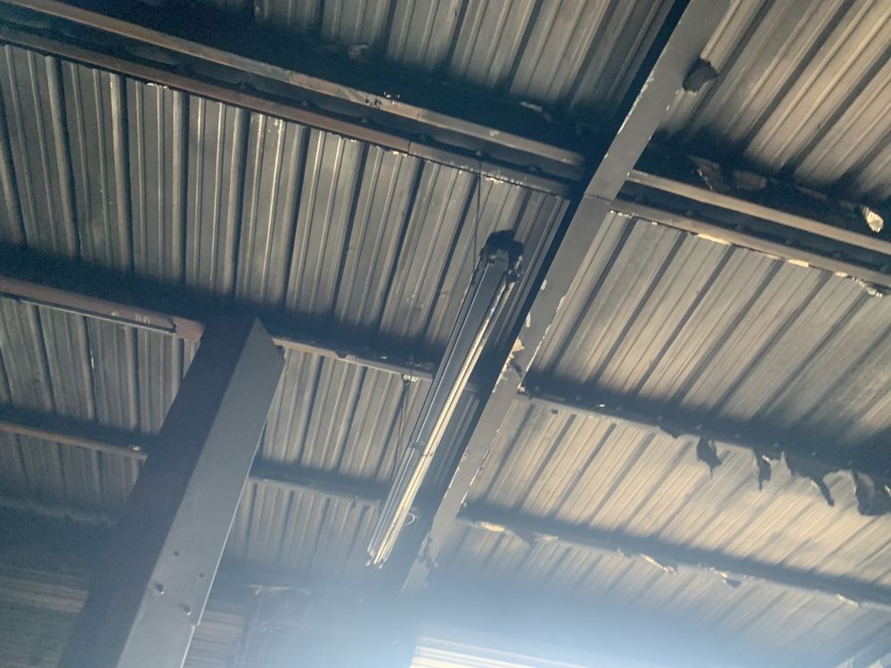 Slide of Structrum Roofing and Construction