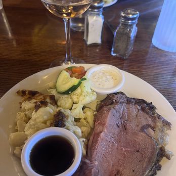 Hunter Steakhouse - Petite Prime Rib with au gratin potatoes and vegetables - Steakhouses Near Me - Oceanside, California Hunter Steakhouse - Petite Prime Rib with au gratin potatoes and vegetables - Steakhouses Near Me - Oceanside, California