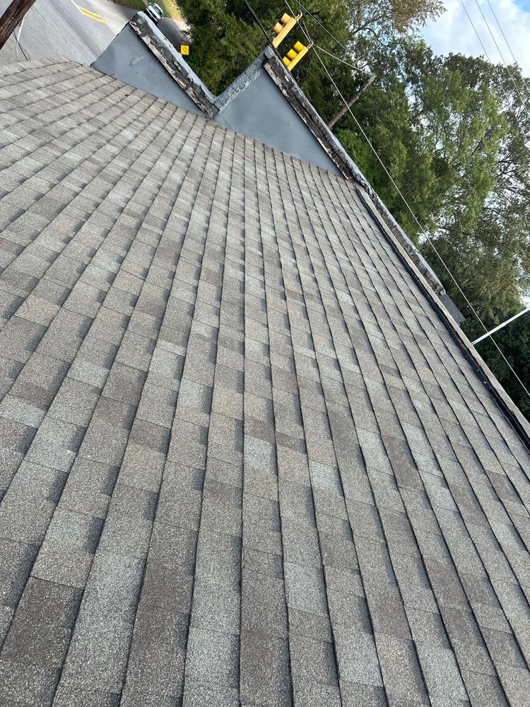 Slide of Dos Amigos Roofing