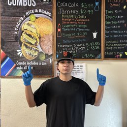 Alejandro proudly showing Menu options Alejandro proudly showing Menu options