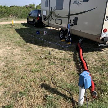 West Rim Rv Park - As you can see the water spout is towards the front. We had to use a hose extender to reach - Parks Near Me - Canyon, Texas West Rim Rv Park - As you can see the water spout is towards the front. We had to use a hose extender to reach - Parks Near Me - Canyon, Texas