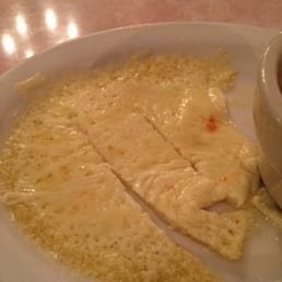 Queso fundido? Yes, those are knife marks.