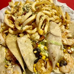 Buffalo's - Grilled shrimp Tacos and Parmesan Fries.