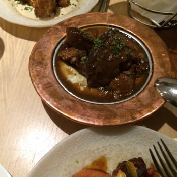Zaytinya - Braised Lamb Shank and crispy cauliflower - Greek Near Me - Washington, DC, District of Columbia Zaytinya - Braised Lamb Shank and crispy cauliflower - Greek Near Me - Washington, DC, District of Columbia