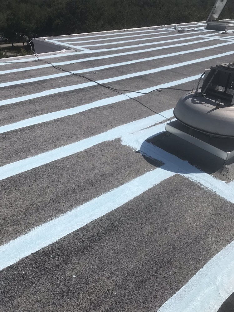 Slide of Dino Roofing Services