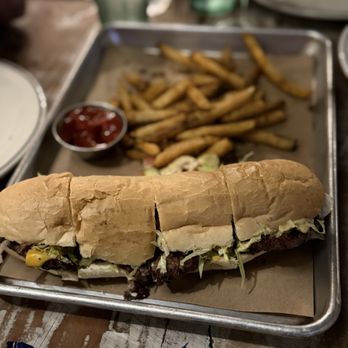 Josephine's Gulf Coast Tradition - Sittin Sidewayz Burger w/ Fries cut 4 ways to share - Seafood Near Me - Houston, Texas Josephine's Gulf Coast Tradition - Sittin Sidewayz Burger w/ Fries cut 4 ways to share - Seafood Near Me - Houston, Texas
