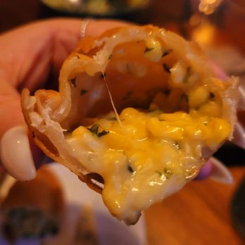 dLeña - cross section of the Empanada de Elote. - Mexican Near Me - Washington, DC, District of Columbia
