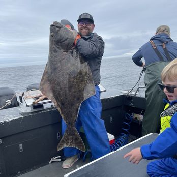 Sitka Fishing Excursions - Reed Wilson with his 53" halibut - Fishing Near Me - Sitka, Alaska