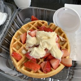 Waffle with strawberries and ice cream Waffle with strawberries and ice cream