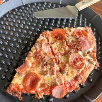 Mother Tucker's Pizza - Medium Meaty Momma on cauliflower crust. - Pizza Near Me - Lamar, Missouri Mother Tucker's Pizza - Medium Meaty Momma on cauliflower crust. - Pizza Near Me - Lamar, Missouri