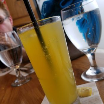 Sangria Cafe - Passion fruit juice w/seltzer - Latin American Near Me - Bronx, New York