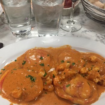 BenCotto - Boston - lobster ravioli entree in a pink cream sauce topped with pieces of lobster - Italian Near Me - Boston, Massachusetts BenCotto - Boston - lobster ravioli entree in a pink cream sauce topped with pieces of lobster - Italian Near Me - Boston, Massachusetts