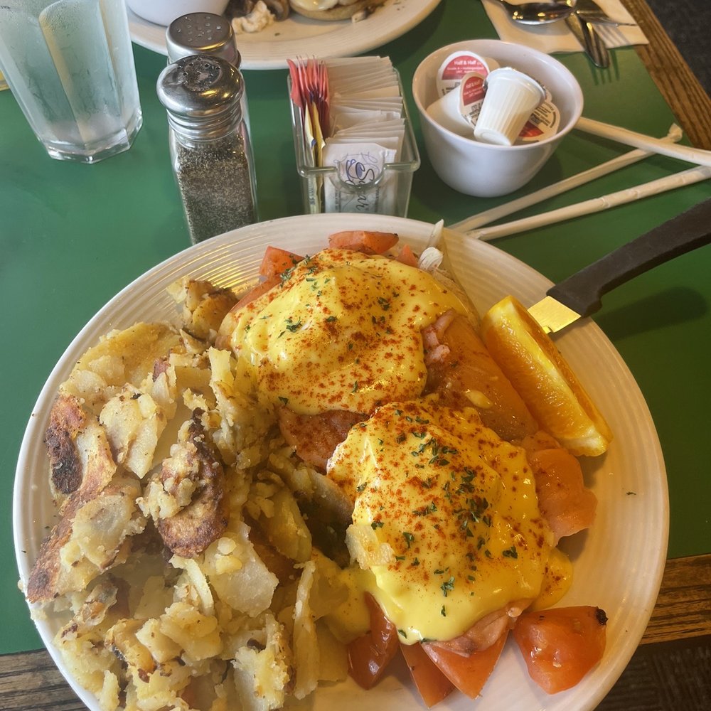 The Frog Pond - Salmon Benedict with potatoes. This is huge - Breakfast & Brunch Near Me - St Pete Beach, Florida The Frog Pond - Salmon Benedict with potatoes. This is huge - Breakfast & Brunch Near Me - St Pete Beach, Florida