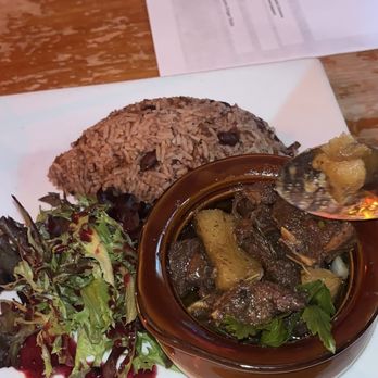 Omar's Kitchen and Rum Bar - Goat stew with Rice and Peas - Caribbean Near Me - New York, New York