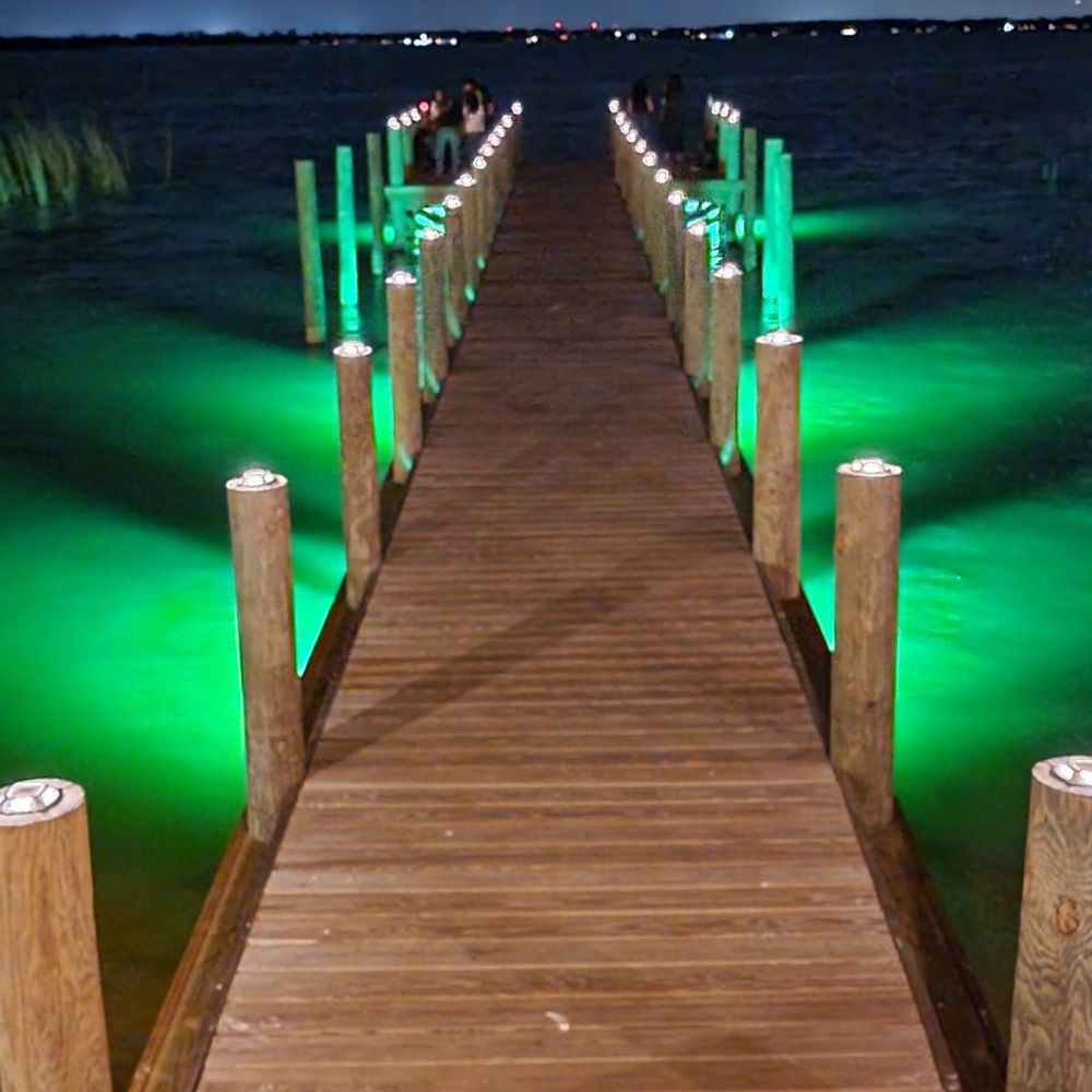 Port 27 - The green glow of the dock lights reflecting off the water on a Florida night? Amazing... - Burgers Near Me - Haines City, Florida