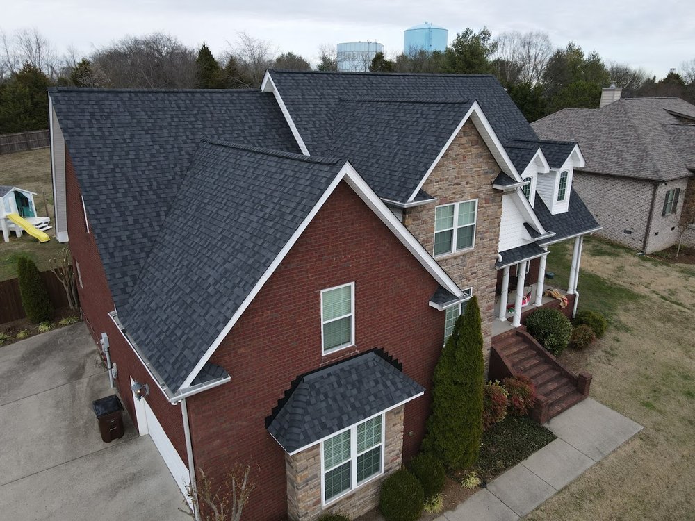 Slide of Gold Medal Roofing Company