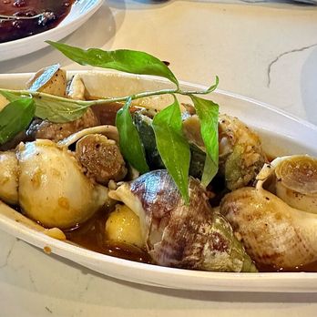 Ocean Grill & Bar - Steamed Canadian snail with lemongrass and one herb - Vietnamese Near Me - Chicago, Illinois Ocean Grill & Bar - Steamed Canadian snail with lemongrass and one herb - Vietnamese Near Me - Chicago, Illinois