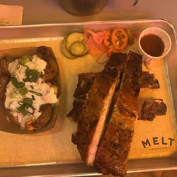 MELT OBERKAMPF - Pork spare ribs with a side of their delicious smashed potatoes.