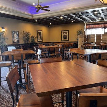 The Cellar Upstairs - tables and chairs in a restaurant - Wine Bars Near Me - St. Augustine, Florida