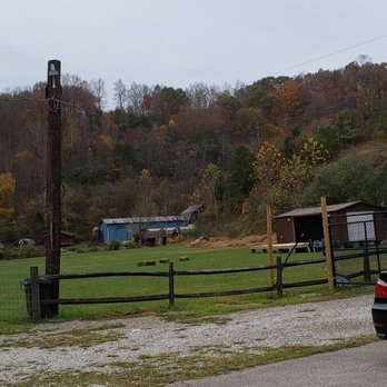 The Farm Bar & Grill - Outdoor concert area in the foreground. Cabins with plumbing for rent in the distance. - Bars Near Me - Charleston, West Virginia The Farm Bar & Grill - Outdoor concert area in the foreground. Cabins with plumbing for rent in the distance. - Bars Near Me - Charleston, West Virginia