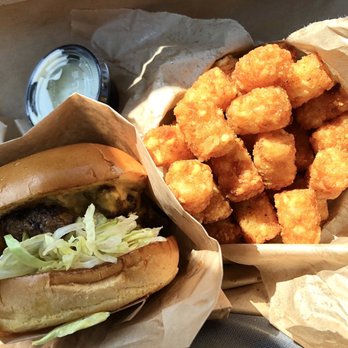 Burger Bench - The Classic Burger with an order of tater tots and a side of ranch. - American Near Me - Escondido, California Burger Bench - The Classic Burger with an order of tater tots and a side of ranch. - American Near Me - Escondido, California