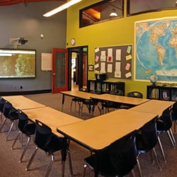 Laurel Academy - A classroom complete with ergonomic chairs and a smart board!
