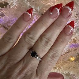 I asked her to do Santa nails and she did a great job!! I asked her to do Santa nails and she did a great job!!