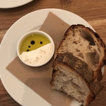 Altro Paradiso - The complimentary bread, ricotta and olive oil to start. - Italian Near Me - New York, New York