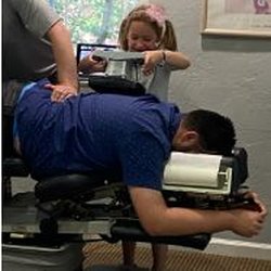 Hickory Chiropractic Clinic - Dr. Dewitt was letting my daughter "help" with my adjustment since she was feeling a bit nervous. Both doctors take great care of the kids.