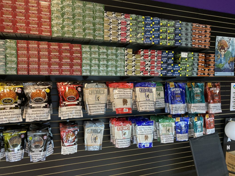 SPRINGS SMOKE SHOP Updated September 2024 2210 Holly Springs Pkwy