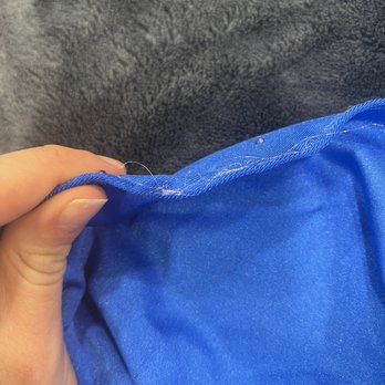 Trendz - This is a photo of the bottom on the dress seems which were falling out and not in a basic straight line and in a Fishing line thread. - Bridal Near Me - Freehold Township, New Jersey