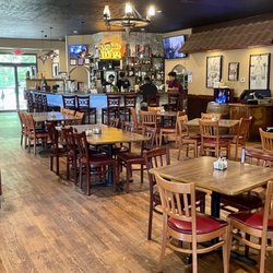 Amigos - Dining room.  There are several more booths upstairs and to the left of this picture.