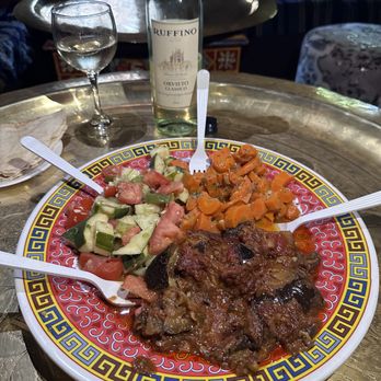 Marrakesh Restaurant - Course 1: Salad platter. Served with pita bread Cucumber + tomato salad Carrots Eggplants - Moroccan Near Me - Philadelphia, Pennsylvania