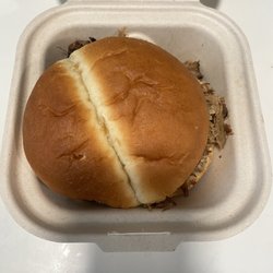 Tin Hut BBQ DuPont - $11 pulled pork sandwich. Bland, dry and greasy.
