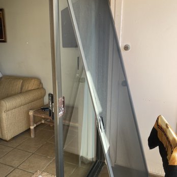 Banyan Harbor Resort - Screen door leaning against condo on balcony - Hotels Near Me - Lihue, Hawaii Banyan Harbor Resort - Screen door leaning against condo on balcony - Hotels Near Me - Lihue, Hawaii