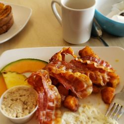 Eggspress - I had a regular breakfast with beans, croutons, two eggs, bacon, seasonal fruits, potatoes and toast.