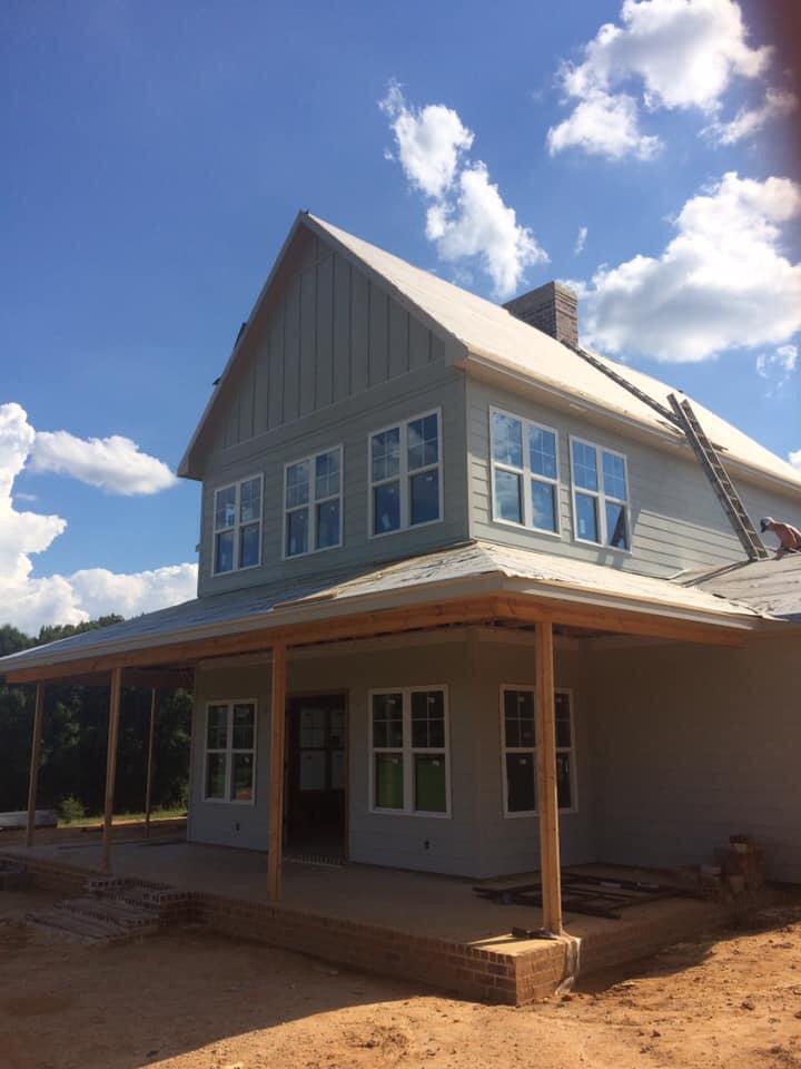 Slide of Roger Moore Roofing & Remodeling Services