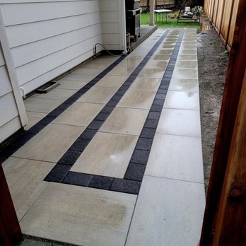 B&B Landscaping Services - a patio with black and white lines - Landscaping Near Me