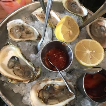 Avocado Grill - 1/2 dozen fresh oysters - Tapas/Small Plates Near Me - West Palm Beach, Florida Avocado Grill - 1/2 dozen fresh oysters - Tapas/Small Plates Near Me - West Palm Beach, Florida