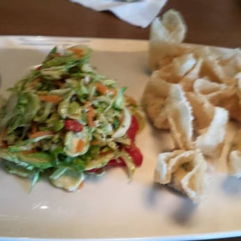 Tupelo Honey Southern Kitchen & Bar - Shaved Brussels sprouts and NC country ham wontons - Southern Near Me - Arlington, Virginia Tupelo Honey Southern Kitchen & Bar - Shaved Brussels sprouts and NC country ham wontons - Southern Near Me - Arlington, Virginia