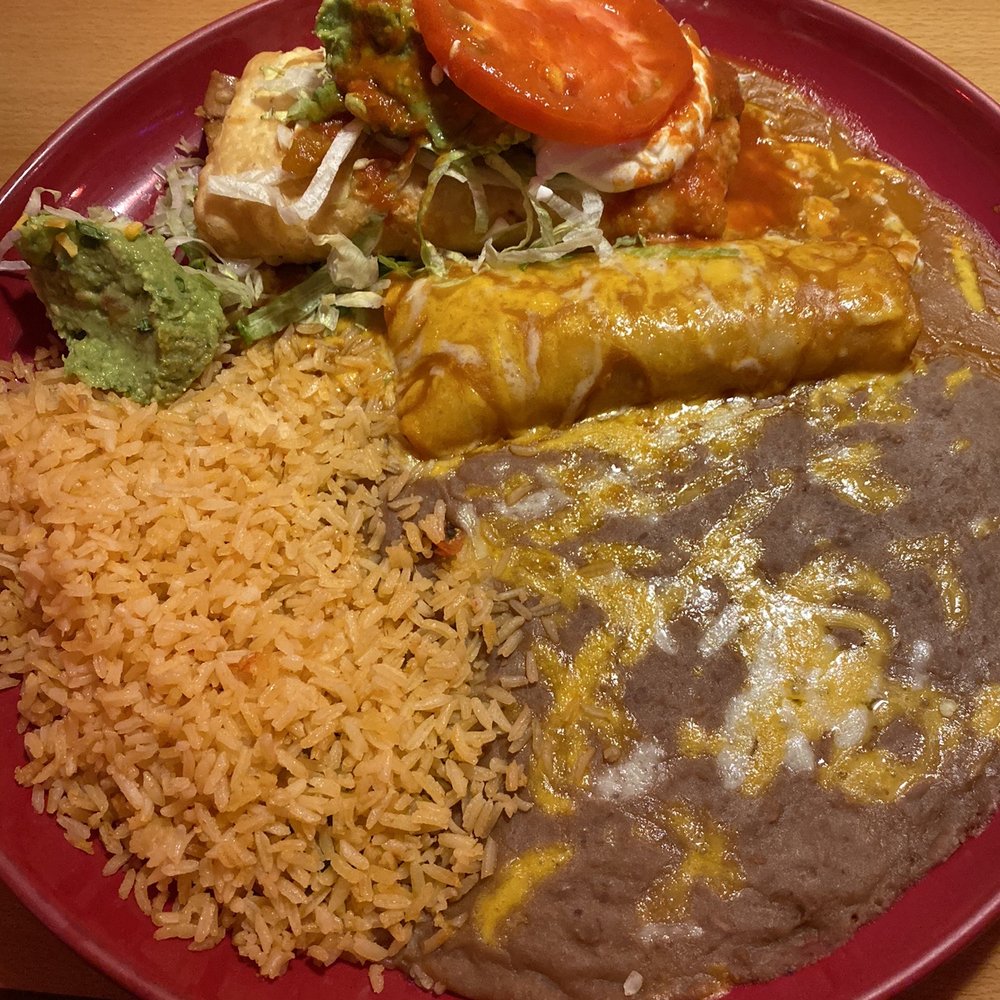 Mi Pueblo - Chicken chimichanga with a chicken enchilada. Delicious! - Mexican Near Me - Bonners Ferry, Idaho